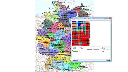 SPECTRAemo Coverage Calculation Map Coverage calculation in progress with SPECTRAemo on a map of Germany, showing transmitter service areas and processing grid